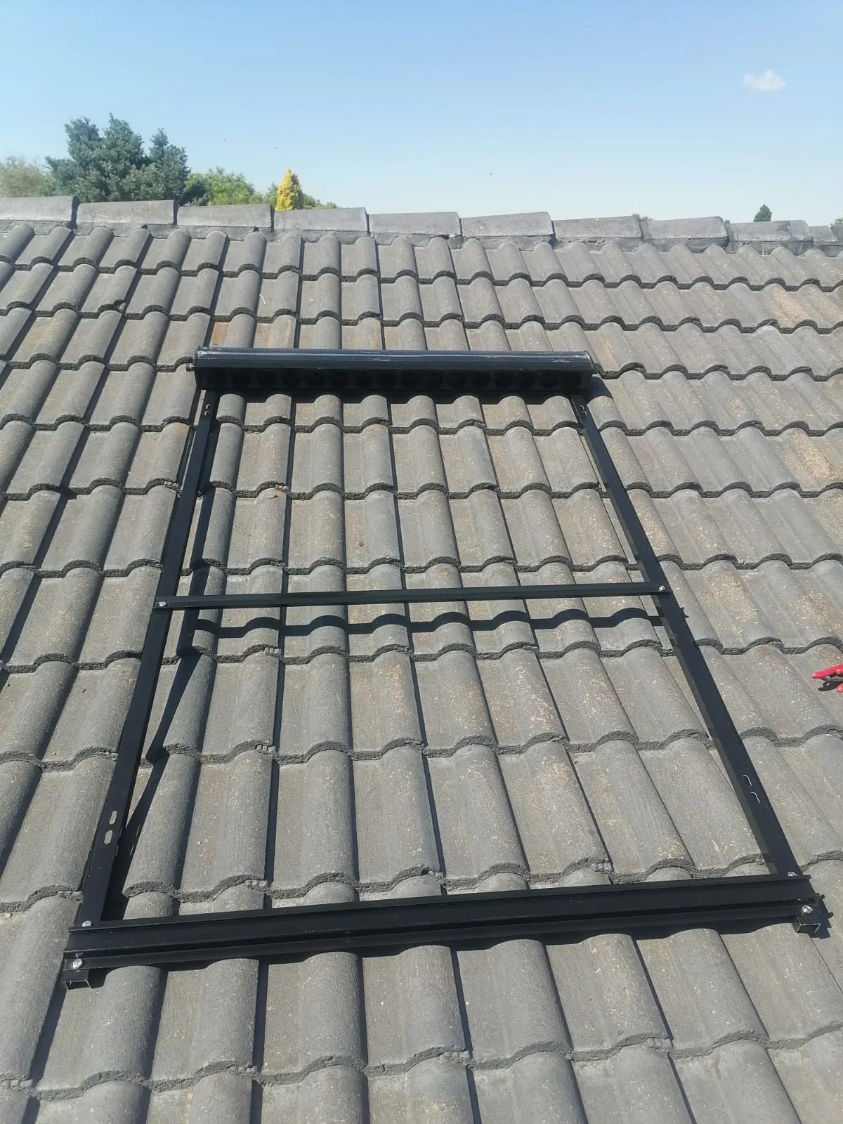 Solar geyser roof mounting frame prepared for installation by Plumb A Nator.